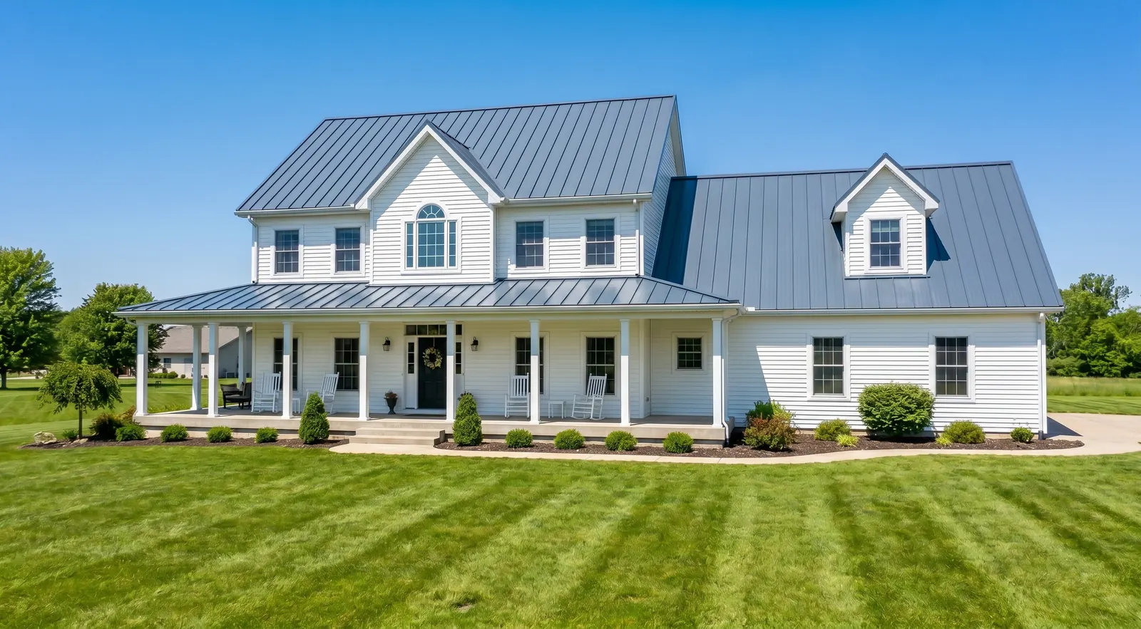 After, new slate-blue standing seam metal roof