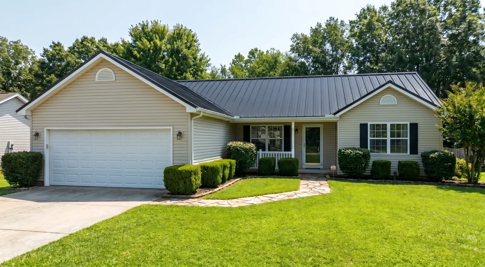 After, new charcoal standing seam metal roof